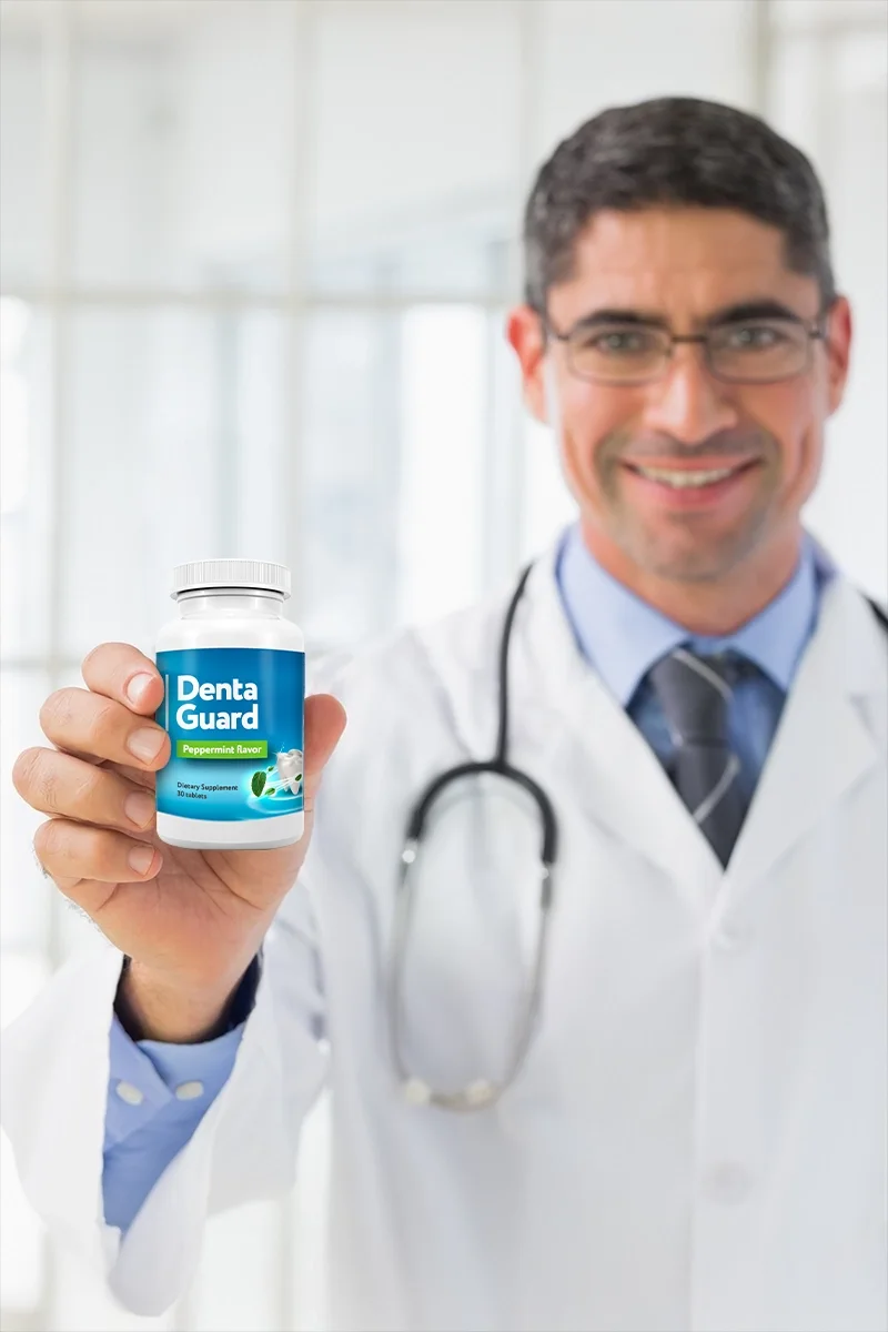 Health professional in a white coat holding a bottle of Denta Guard oral probiotic tablets